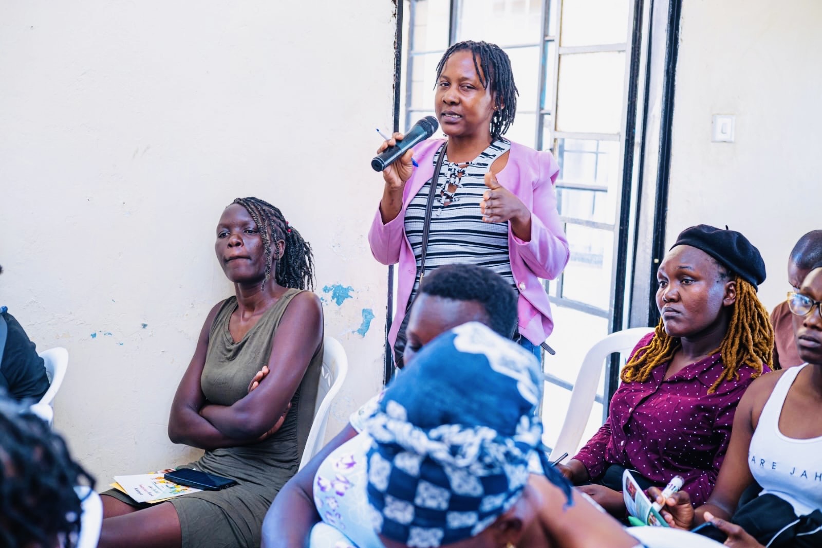 A woman contributing during a THRIVE Action community participation session
